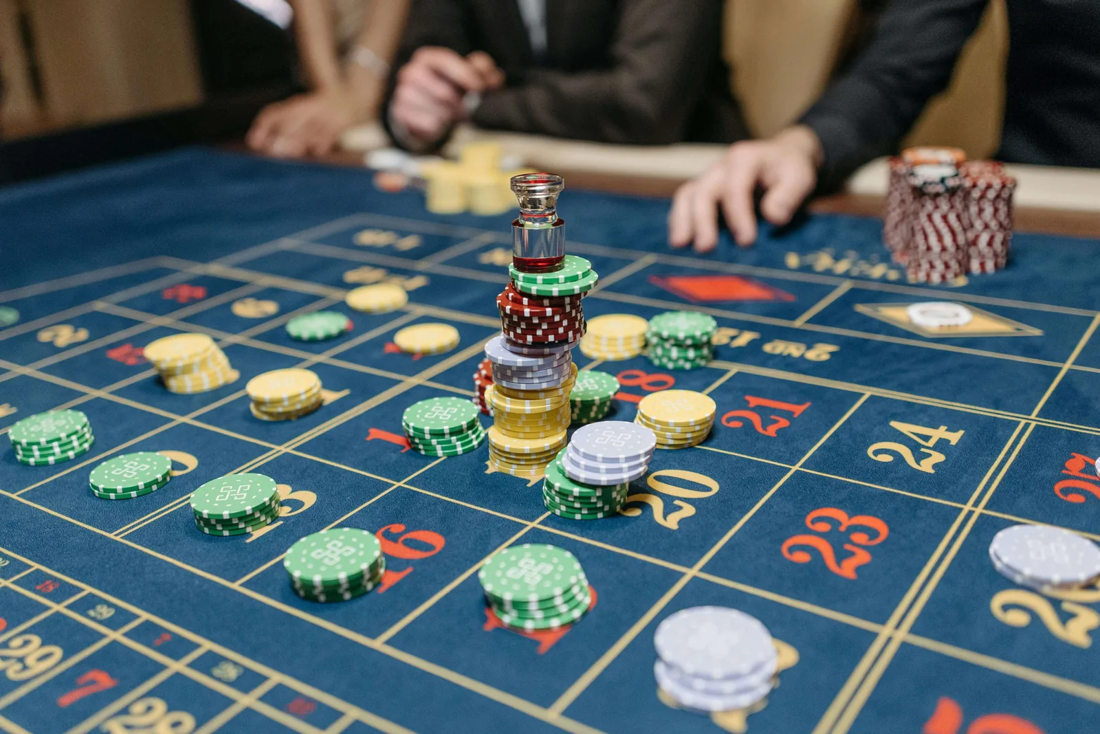 A casino table layout in printed Velvetine - chips and felt visible at close range